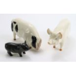 Beswick. Three Beswick pigs, including CH Wallboy 53, largest length 17cm approx.