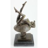 Heavy Bronze figure depicting a nude woman on a mushroom. Set on a marble base