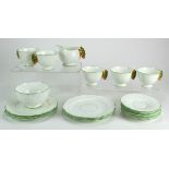 Aynsley Interest. A part Aynsley bone china tea service leaf moulded white ground, decorated with