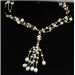 Seed pearl necklace with 14ct gold clasp and central Chinese pendant, contained in a case