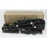Bagpipes. A set of bagpipes, made by R. G. Lawrie Ltd (Glasgow), etched with the makers name,