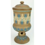 Doulton Lambeth stoneware water dispenser. Applied decoration in blues and cream on a beige