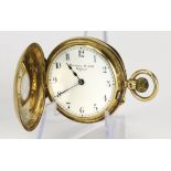 Mid-size 18ct cased half-hunter pocket watch. Hallmarked London 1895. The signed white dial with