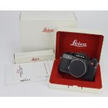 Leica R-E camera body (no. 1782576), with user manual, contained in original makers presentation