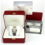 Gents stainless steel & gold Cartier Tank automatic wristwatch, purchased 2007. Complete with