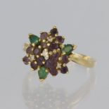 18ct yellow gold cluster dress ring set with fifteen round 2mm round rubies and three pear shaped