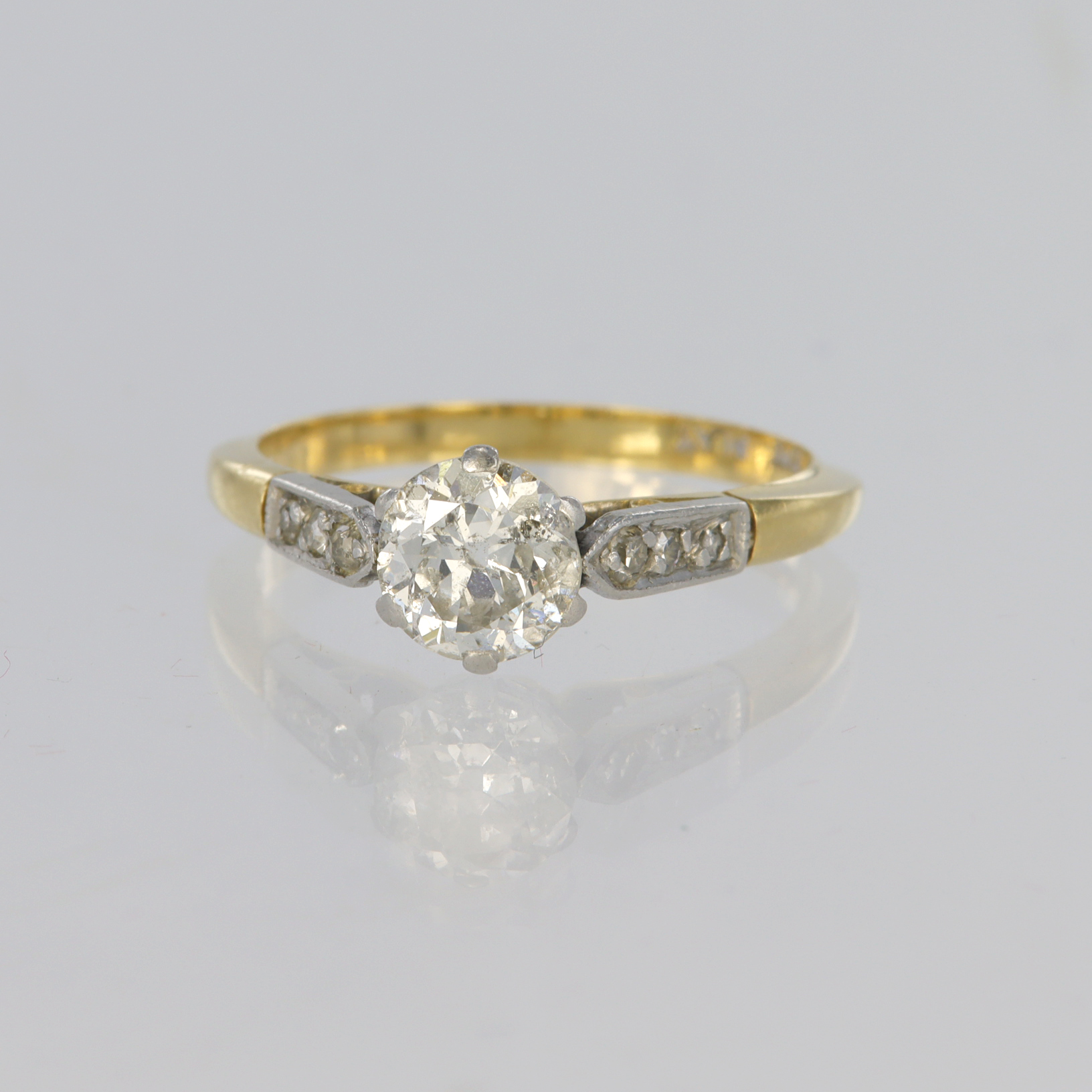 18ct yellow gold and platinum solitaire ring set with round old cut diamond weighing approx. 0.