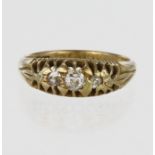 18ct yellow gold graduated three stone boat shaped ring set with three old cut diamonds weighing a