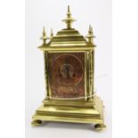 Brass mantel clock with copper panels depicting birds amongst foliage, movement in need of some