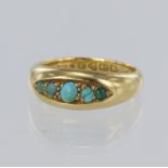 18ct gold ring set with five cabochon cut turquoise stones, hallmarked Chester 1916. Total weight
