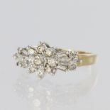 14ct yellow gold dress ring set with a central nine stone cluster featuring round brilliant cut