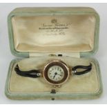 Ladies 9ct cased wristwatch in its orignal box with some paperwork dating to jan 16th 1922, watch