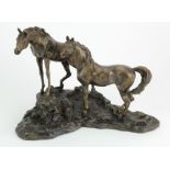 Bronze statuette depicting a pair of horses. "Intruder" signed Lanford Monroe 1983