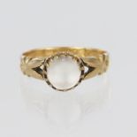 9ct yellow gold ring set with a single moonstone cabochon measuring approx. 7mm diameter in a