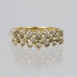 14ct yellow gold dress ring featuring twenty round brilliant cut diamonds all claw set in a three