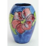 Moorcroft. Blue Clematis design (1953-1978) small vase. Label attached to base. Height measures