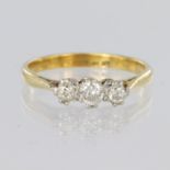 18ct yellow gold and platinum trilogy ring set with three graduated round brilliant cut diamonds