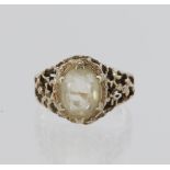 9ct yellow gold ring set with an oval citrine measuring approx. 10mm x 8mm, with pierced