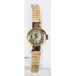 Ladies 9ct cased Longines wristwatch on a 9ct bracelet, total weight 20.4g, watch working when