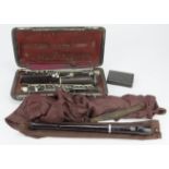 Instruments. Three musical instruments, comprising a cased Jacques Albert clarinet, Boosey & Co.