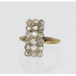 18ct yellow gold ring with rectangular white gold head measuring approx. 25mm x 8mm, head set with