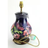Moorcroft Large "Peony" on a blue ground table lamp . Approx 13 inches tall. 1st quality
