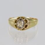 18ct yellow gold ring set with a single oval rose cut diamond in a rub over collet with scalloped