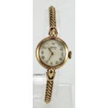 Ladies 9ct cased Vertex wristwatch on a 9ct bracelet, total weight 14.4g, watch working when