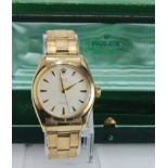 Gents 9ct gold cased Rolex Precision wristwatch. The cream dial with gilt dart markers, on a 9ct