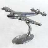 RAF desk ornament in the form of a four engine bomber.