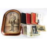 Mostly WW1 related soldiers documents, paperwork, photos, large glazed photo (glass a/f), few books.