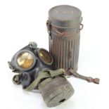 German Gasmask 1942 lens with tin, owners initials painted to lid 'Sch.A.'.