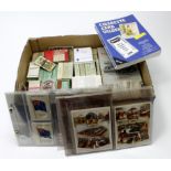 Blue box with a varied selection of mostly Cigarette Cards in old packets, albums and loose. Noted