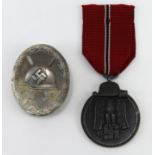 German Eastern Front Medal & Silver Wound Badge with Certificates Awarded to the same soldier.