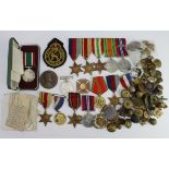 Mixed lot of various WW2 medals, other medals, and a range of Cap badges, buttons, etc etc. (Qty)