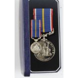 National service medal in case with miniature.