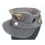 German Luftwaffe Paratroopers M43 Forage cap, with shooting star badge to side, service worn.