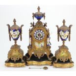 Clock garniture, circa late 19th to early 20th Century, enamel with figural & floral decoration,