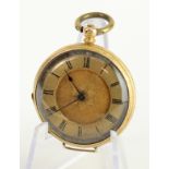 Mid-size 18ct cased open face pocket watch. The gilt dial with black roman numerals. Not working.