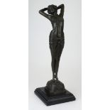 Bronze figure of a semi-nude woman. Signed Philips to base along with title, 'Reveil' (waking up)