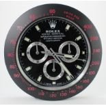 Advertising Wall Clock. Matt black 'Rolex' style advertising wall clock, black dial reads 'Rolex