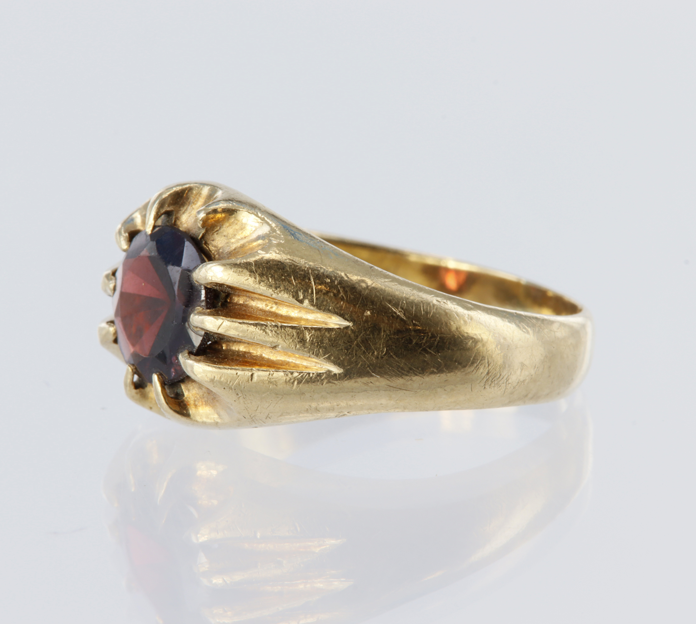 9ct yellow gold signet style ring set with a single round garnet measuring approx. 7mm in a gypsy - Image 2 of 2