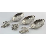 Three Dutch silver christening spoons with tops depicting St. George and the dragon. All bear