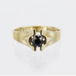 9ct yellow gold ring set with a single round sapphire measuring approx. 4mm diameter, set in a six