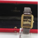 Mid-size 18ct cased wristwatch by Corum. On its original strap, Watch working when catalogued