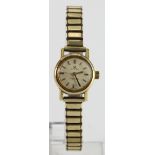 Ladies 18ct cased Omega Ladymatic wristwatch, working when catalogued and on an expandable strap