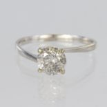 White metal solitaire ring set with a round brilliant cut diamond weighing approx. 1.0ct in a four