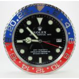 Advertising Wall Clock. Red & blue (Pepsi) 'Rolex' style advertising wall clock, black dial reads '