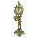 Brass mantel clock by the Ansonia Clock Co., depicting cupid holding the clock face, enamel dial