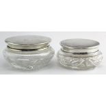 Two silver & glass Art Deco powder bowls, lids are hallmarked Birm. 1937 & 1949. Weight of silver